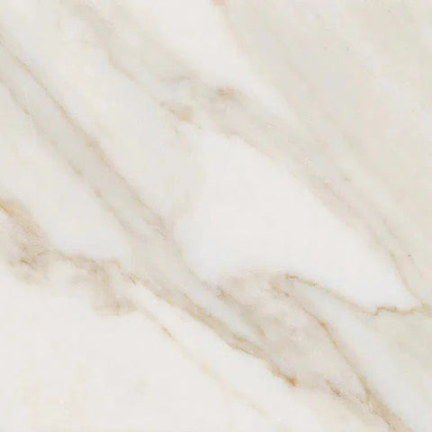 Veined marble slab from the Calacatta Gold Marble collection showcasing elegant patterns.