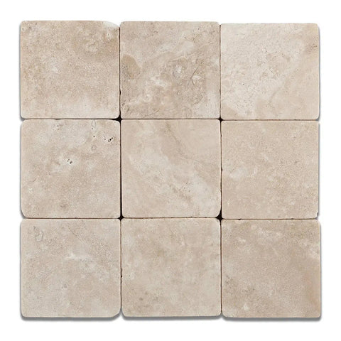 Nine beige travertine tiles from the Durango Paredon Mexican Cream Traverine collection.