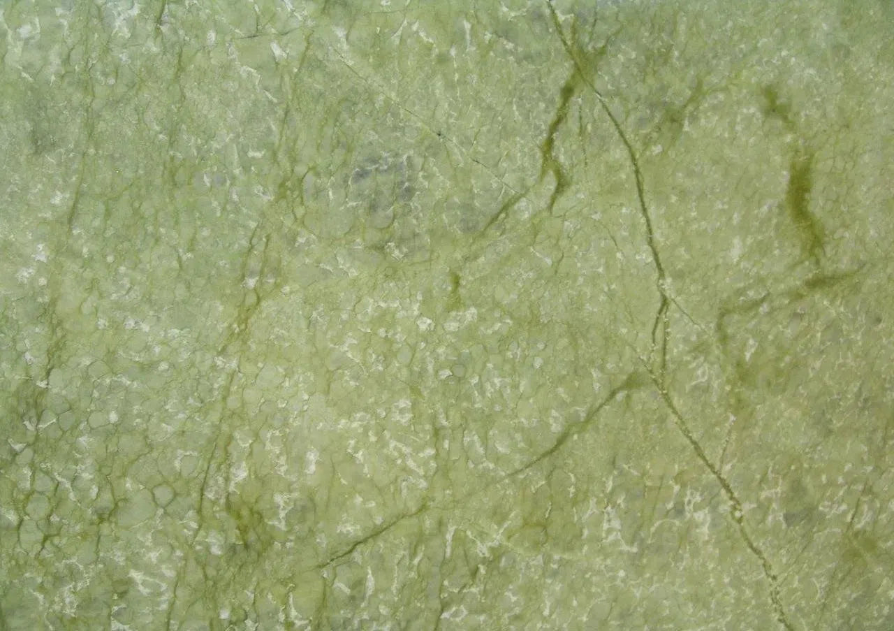 Green marble texture from the Ming Green Marble collection showcasing its unique pattern.