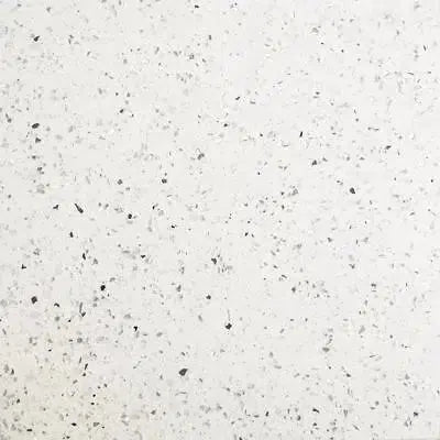 White speckled surface of a Quartz collection showcasing natural elegance and beauty.