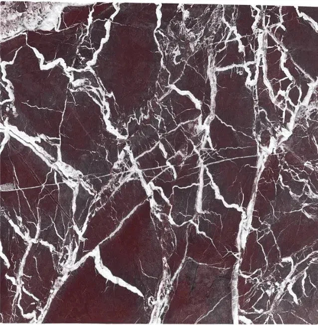 Maroon marble with white veining in the Rosso Levanto Marble collection.