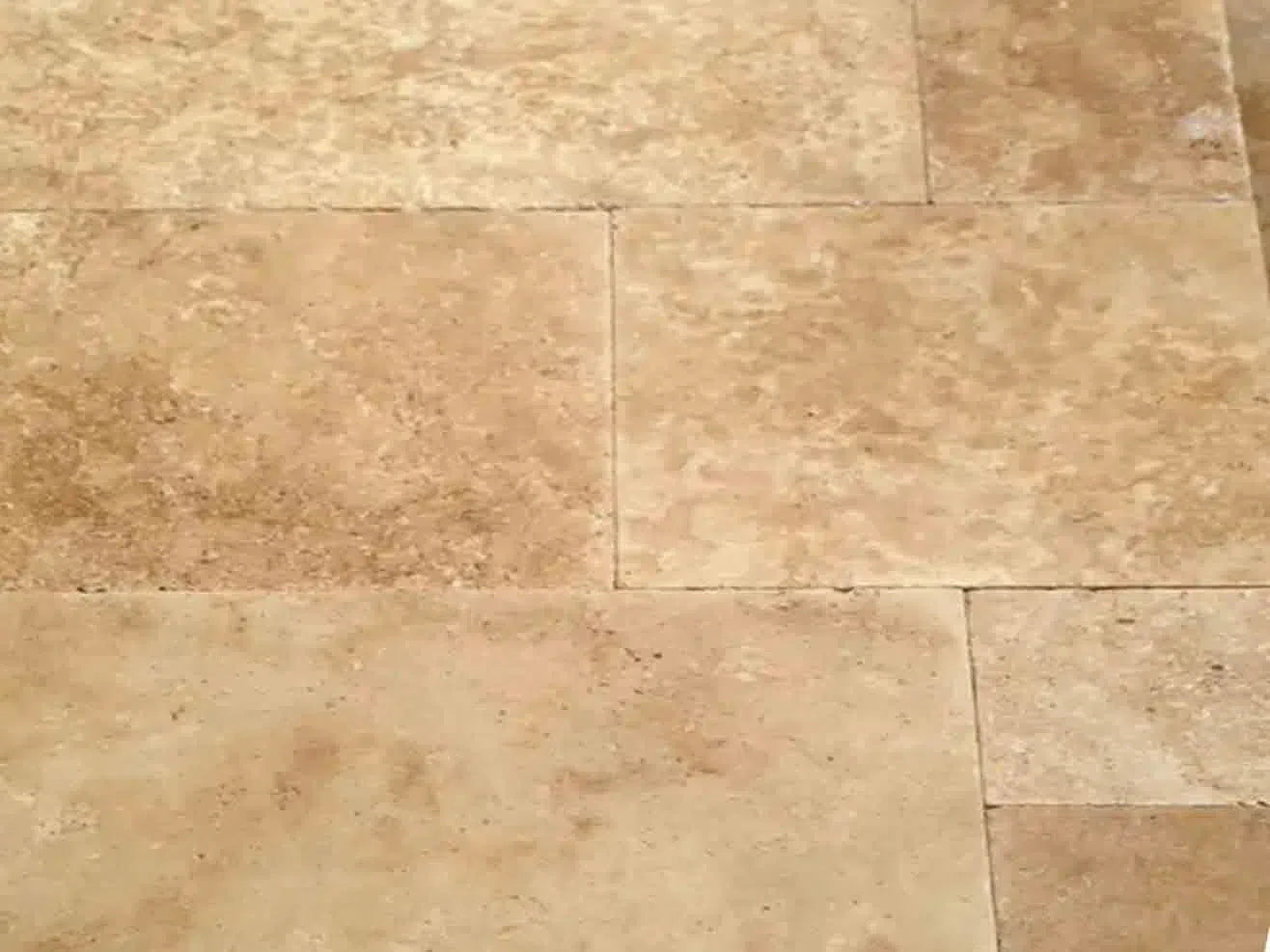 Walnut Travertine tile flooring showcasing elegant natural stone aesthetics.