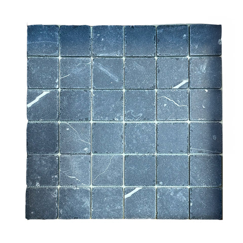 Square mosaic tile sheet showcasing elegant marble surfaces for interior transformation.