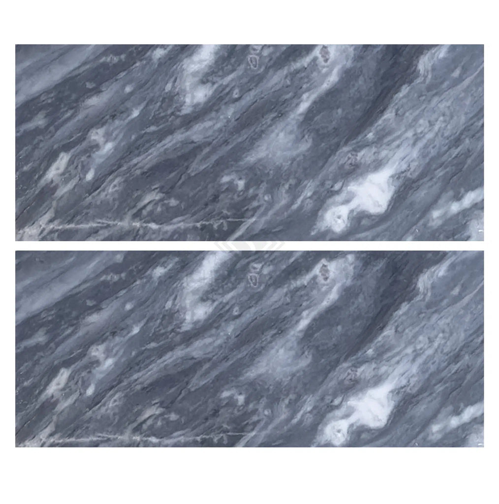 Two rectangular slabs of Bardiglio Nuvolato (Italian) 12X24 Marble Polished-Honed with elegant white veining are shown side by side against a pristine white background. SurfacesGalore offers the finest in gray marble for sophisticated spaces.