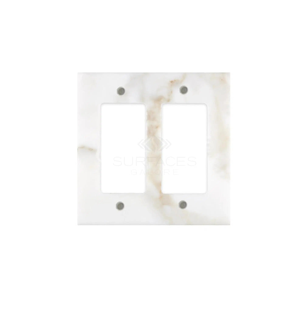 The Calacatta Gold Marble Double ROCKER Switch Wall Plate by SurfacesGalore features a sophisticated white and gray pattern with two rectangular openings and four screw holes. This luxury switch plate cover showcases natural stone variations, making each piece uniquely elegant.