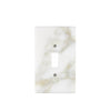 Experience the elegant appeal of luxury switch plate covers with the Calacatta Gold Marble Single Toggle Plate from SurfacesGalore, featuring a stunning marble pattern against a white background.