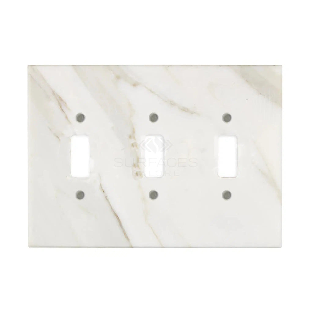 Introducing the Calacatta Gold Marble Triple Toggle Plate Switch Wall Plate by SurfacesGalore. Crafted from genuine marble with a smooth, polished finish and subtle gray veining, this elegant wall plate is the perfect addition to your natural stone home decor.