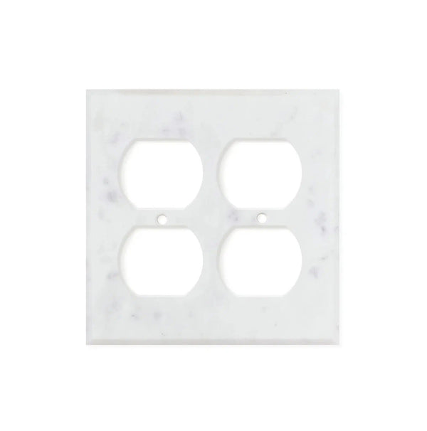 The Carrara White Marble Double DUPLEX Switch Wall Plate from SurfacesGalore features natural stone variations, adding a unique touch to any room. This authentic marble cover plate has four openings for electrical sockets.