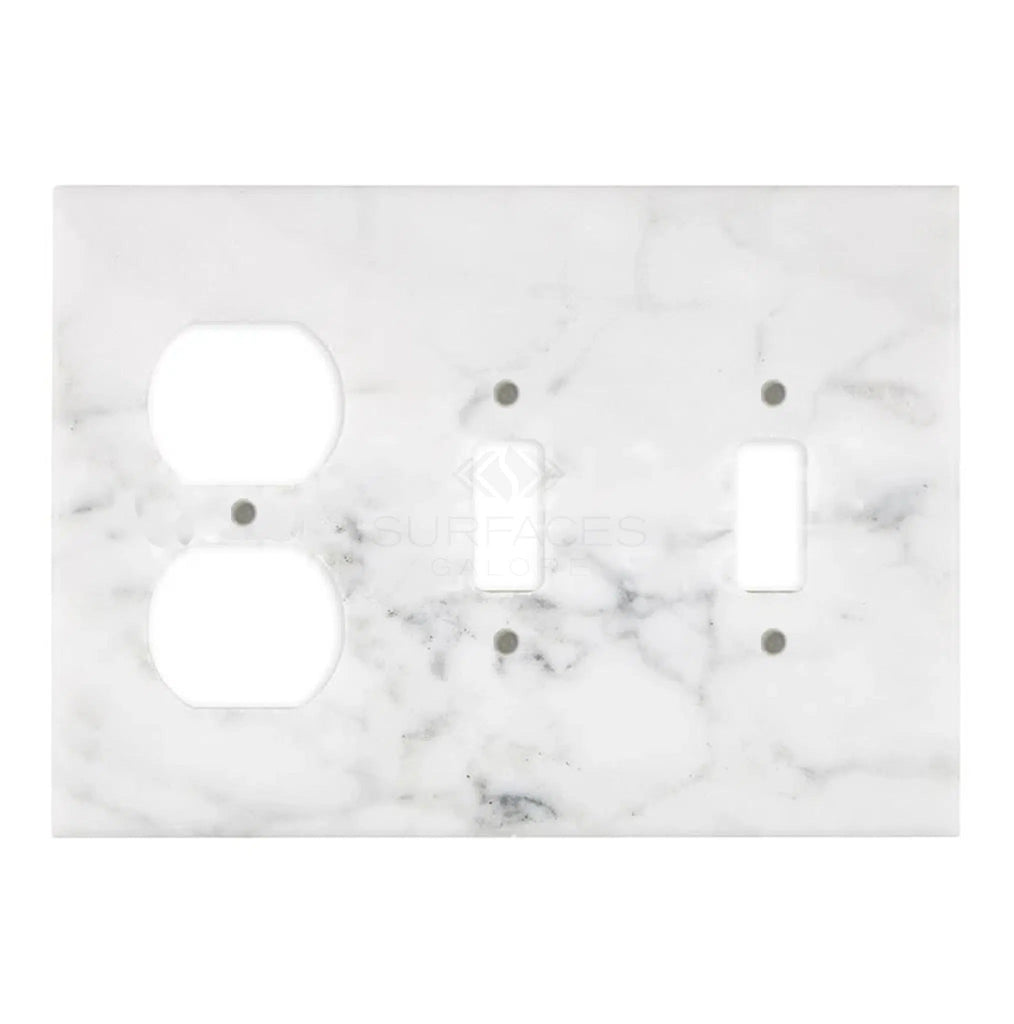 The Carrara White Marble Double TOGGLE - DUPLEX Switch Wall Plate/Cover Plate by SurfacesGalore is a luxurious switch plate cover made from authentic white marble, designed to accommodate one toggle switch and two duplex outlets, seamlessly blending natural stone décor with functionality.