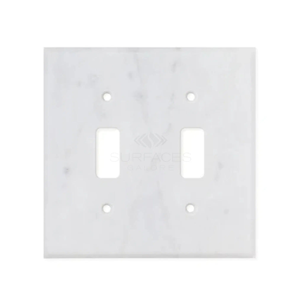 The SurfacesGalore Carrara White Marble Double Toggle Switch Plate, made from authentic natural stone, features four screw holes.