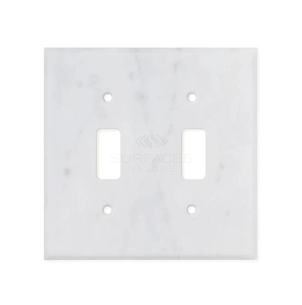 The SurfacesGalore Carrara White Marble Double Toggle Switch Plate, made from authentic natural stone, features four screw holes.