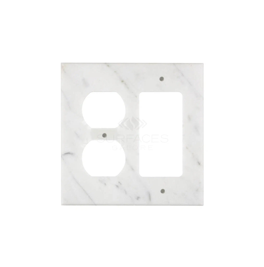 Introducing the Carrara White Marble ROCKER - DUPLEX Switch Wall Plate from SurfacesGalore, featuring two round openings for outlets and one rectangular opening for a switch—perfect for adding a touch of luxury to your home decor.