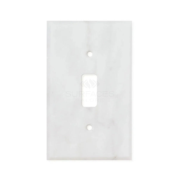 The SurfacesGalore Carrara White Marble Single Toggle Plate Switch Wall Plate, crafted from authentic natural stone, features a single switch opening and two screw holes.