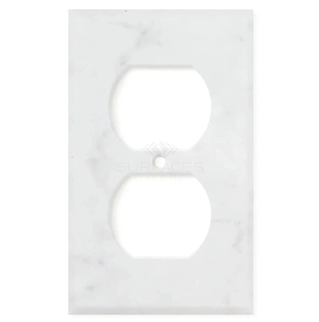 The Carrara White Marble Single DUPLEX Plate Switch Wall Plate by SurfacesGalore, featuring two cutouts for sockets, brings elegance to your space.