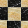 The Checkerboard Marble - Travertine Tile Honey Onyx Marble and Nero Marquina Marble 12X12 Set from SurfacesGalore features black and yellow tiles with white veining, creating a striking luxury design with natural stone.