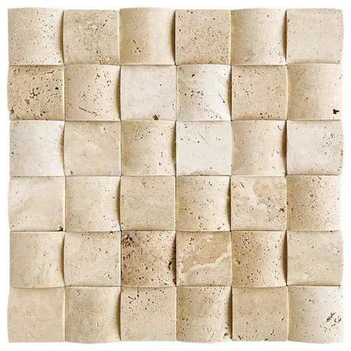 A square pattern composed of 36 small Ivory (Light) Travertine 2X2 Round-Faced (CNC-Arched / Wavy) Mosaic tiles by SurfacesGalore, arranged in a 6x6 grid. The tiles have slight variations in color, texture, and contours, giving them a natural, uneven appearance.