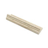 An Ivory (Light) Travertine 2X3X12 Corner-Ogee (Stair-tread) Trim Liner Honed from SurfacesGalore features a beige stone molding with a grooved design laid on a white background. The surface possesses a textured, slightly porous appearance typical of travertine. This rectangular molding includes a rounded edge on one side, adding to its elegance.