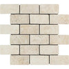 A square mosaic of rectangular Ivory (Light) Travertine tiles from SurfacesGalore, arranged in a staggered brick pattern and enhanced with a tumbled finish, perfect for elevating any space.