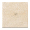 An Ivory (Light) Travertine 4x4 (Cross-Cut) Tumbled tile, adorned with the SurfacesGalore logo, offers a premium finish ideal for elegant spaces.