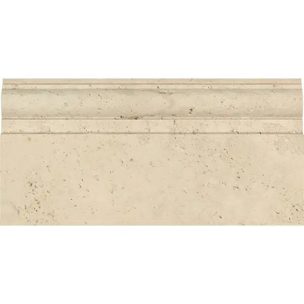 An Ivory (Light) Travertine 5X12 Baseboard Trim Liner Honed from SurfacesGalore featuring subtle speckles and a natural texture. The baseboard boasts a simple, classic molding design at the top edge, offering a refined and elegant appearance ideal for architectural finishes. It perfectly complements other light travertine surfaces for a cohesive look.