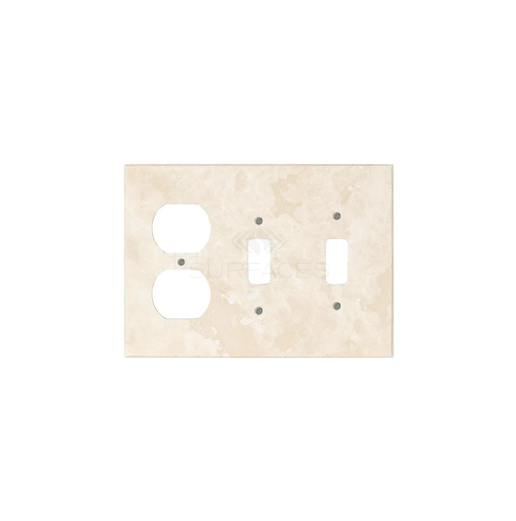 The Ivory (Light) Travertine Double TOGGLE - DUPLEX Switch Wall Plate/Cover Plate/Switch Plate by SurfacesGalore features two outlet openings on the left and one switch opening on the right, seamlessly blending functionality with elegance.