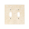 An ivory (light) travertine double toggle switch plate from SurfacesGalore, perfect for those seeking natural stone switch covers to elevate their luxury home decor.