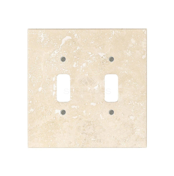 An ivory (light) travertine double toggle switch plate from SurfacesGalore, perfect for those seeking natural stone switch covers to elevate their luxury home decor.