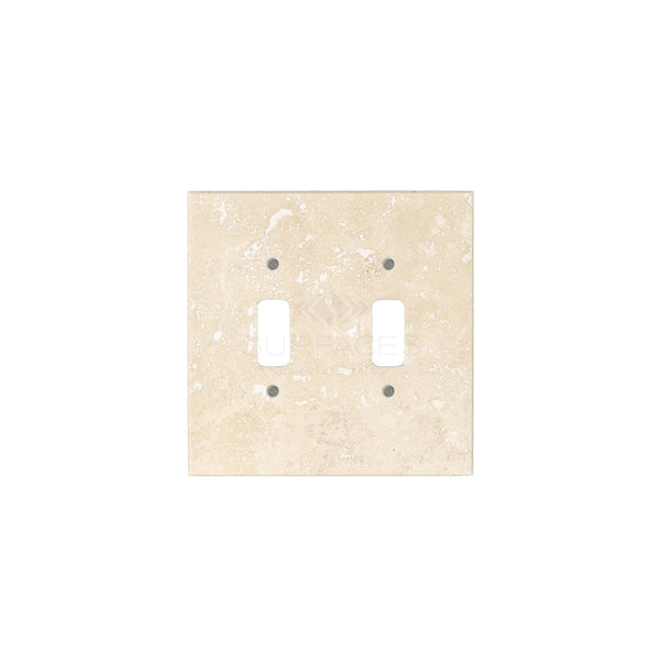 The SurfacesGalore Ivory (Light) Travertine Double TOGGLE Plate Switch Wall Plate boasts a luxurious square design with two vertical switch openings, crafted from authentic travertine stone in a beautiful beige finish—perfect for upscale home decor.