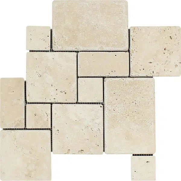 The Ivory (Light) Travertine OPUS Mini-Pattern (4 pcs.) Mosaic (Interlocking) Tumbled from SurfacesGalore features a blend of square and rectangular beige tiles with a rough texture. These premium tiles are arranged in a staggered layout, creating an intricate design with subtle color variations that give the appearance of natural stone.