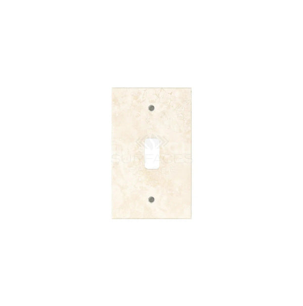 An Ivory (Light) Travertine Single TOGGLE Plate Switch Wall Plate/Cover Plate/Switch Plate by SurfacesGalore, featuring a rectangular cutout and two screw holes, designed to seamlessly blend with authentic marble wall plate covers.