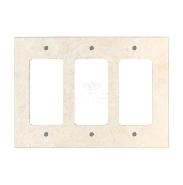 The Ivory (Light) Travertine Triple ROCKER Switch Wall Plate by SurfacesGalore is a beige rectangular cover with three vertical openings and four mounting holes, designed to resemble natural stone marble.