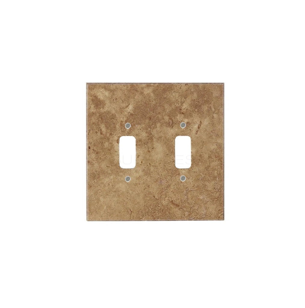 The Noce Travertine Double TOGGLE Plate Switch Wall Plate/Cover Plate/Switch Plate by SurfacesGalore exhibits authentic marble wall plate craftsmanship with two rectangular openings, adding a touch of luxury against a white background.