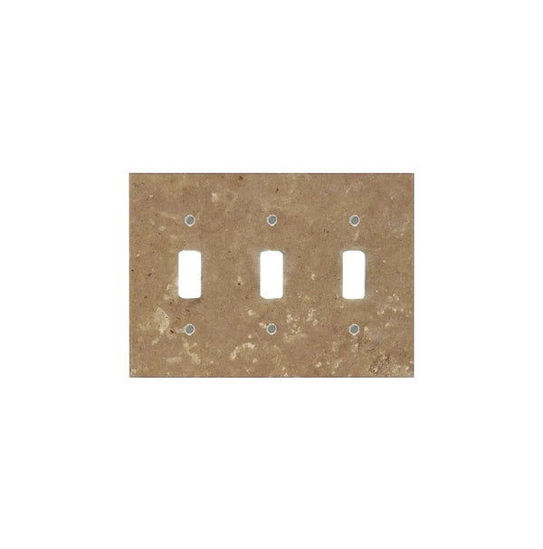 A Noce Travertine triple toggle plate switch cover plate from SurfacesGalore, made from authentic marble in a speckled beige design, featuring spaces for three switches against a white background.