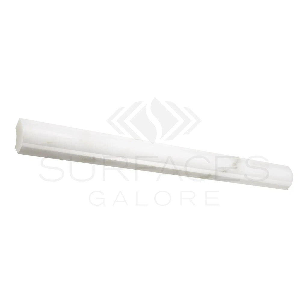 The Oriental White / Asian Statuary 1X12 Quarter-Round Trim Polished by SurfacesGalore features beveled edges, light grey veining, and a smooth finish, evoking a classic aesthetic on a white background reminiscent of luxurious Oriental White marble countertops.