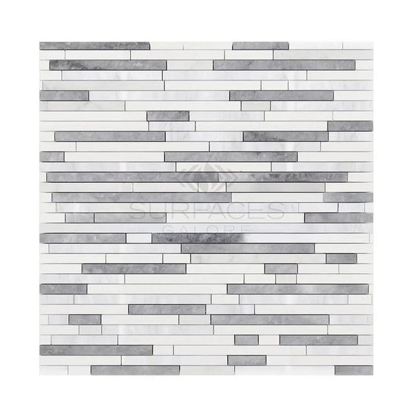 A modern mosaic design is achieved by horizontally stacking white and gray rectangular tiles from SurfacesGalore's Oriental White / Asian Statuary Bamboo Sticks (Thassos+Oriental White+Blue-Gray) Marble Mosaic, adding a luxurious touch with polished and honed finishes.