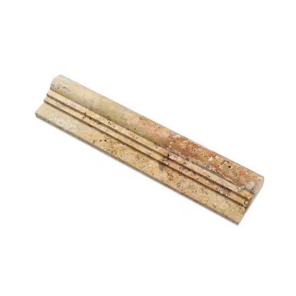 A rectangular, beige marble trim piece with a grooved design in the center, available at SurfacesGalore, is the Scabos Travertine 2 1/2X12 OG-2 (Double-Step Chair Rail Trim) Liner Honed.