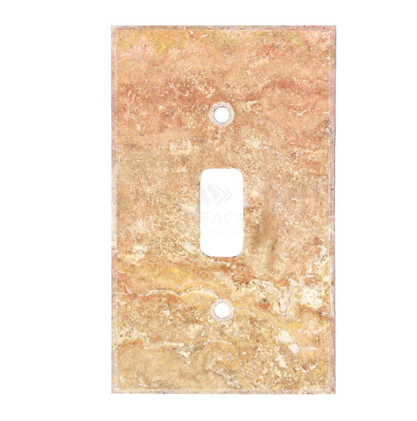 The Scabos Travertine Single TOGGLE Plate Switch Wall Plate from SurfacesGalore is a luxury home decor item featuring a rectangular cutout and two screw holes. Crafted from natural stone, this light brown switch cover plate is an elegant addition to any room.