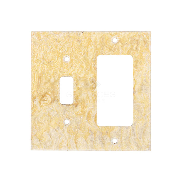 Presenting the Scabos Travertine TOGGLE - ROCKER Switch Wall Plate from SurfacesGalore, a textured yellow cover designed to mimic the elegant look of natural stone, featuring one rectangular and one toggle switch opening.