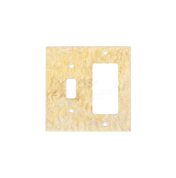 A Scabos Travertine TOGGLE - ROCKER Switch Wall Plate/Cover Plate/Switch Plate by SurfacesGalore features a yellow textured design reminiscent of natural stone with two switch openings, set against a pristine white background.