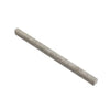 A single cylindrical Silver (Gray) Travertine 1/2X12 Pencil Liner Honed from SurfacesGalore lies diagonally on a plain, white background, evoking the sophisticated appearance of elegant countertops.