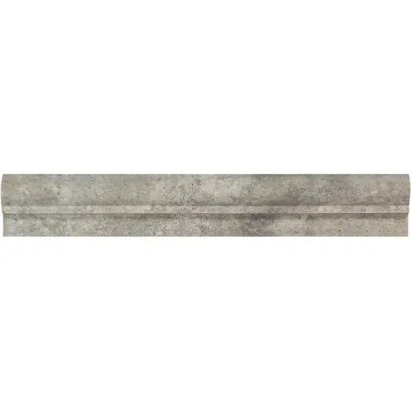 A long, rectangular trim piece with a slightly raised center and textured appearance, featuring elegant silver-gray tones, from SurfacesGalore's Silver (Gray) Travertine 2 1/2X12 OG-2 (Double-Step Chair Rail Trim) Liner collection.