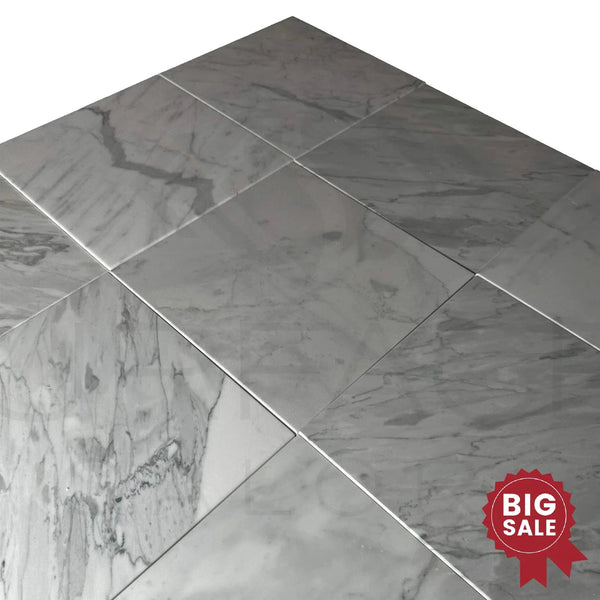 The Statuarietto Madley / White 12X12 Polished Marble Tile from SurfacesGalore showcases an eye-catching "Big Sale" red badge, emphasizing discounted prices during the clearance sale.