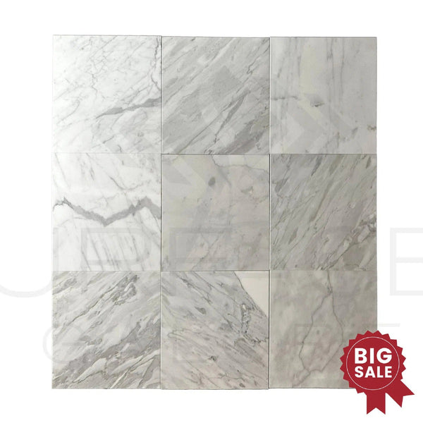 Introducing the "Statuarietto Madley / White 12X12 Polished Marble Tile" set from SurfacesGalore, featuring nine exquisite marble tiles adorned with unique gray veining. Available at special discounted prices, and make sure to look for the "Big Sale" badge in the bottom right corner!