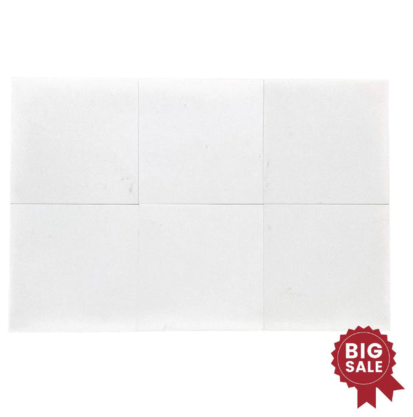 Thassos (Greek) White Marble (Snow White) Standard Quality 12X12 Honed Tile by SurfacesGalore with six tiles on display, featuring a striking red "Big Sale" badge in the bottom right corner to highlight discounted prices.