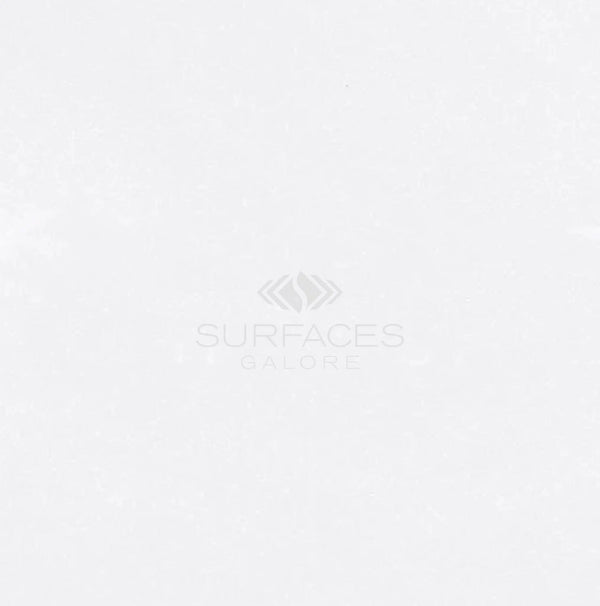 Polished-honed white surface with subtle texture, showcasing the "SurfacesGalore" logo in the center. Resembling the elegance of Thassos White (Greek) 18X18 Marble, it exudes a pure, pristine aesthetic.