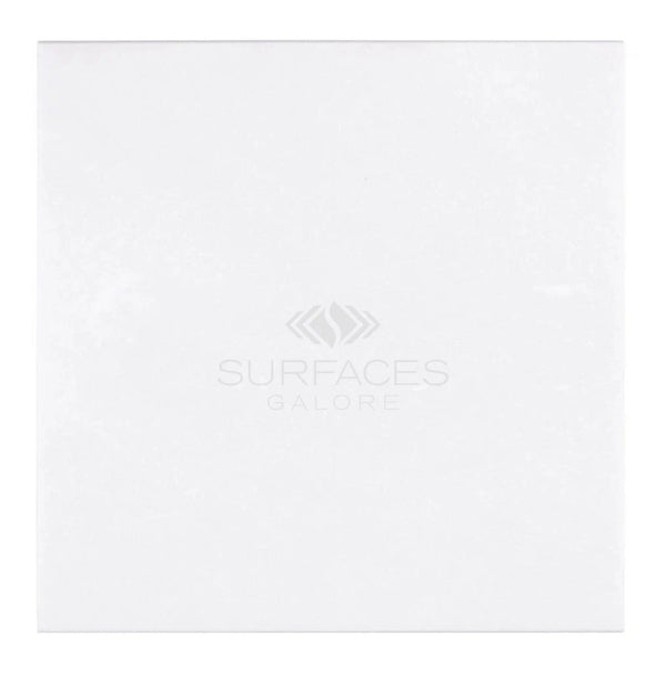 A Thassos White (Greek) 18X18 Marble Polished-Honed rectangular surface with the text "SurfacesGalore" and a logo in the center.