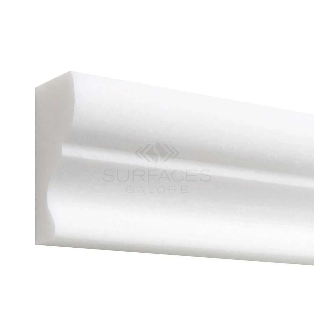 A rectangular crown molding, labeled "SurfacesGalore," features a polished and honed Thassos White (Greek) marble in pure white, ideal for versatile applications.