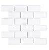 White rectangular tiles arranged in a brick pattern on a white background exude a luxurious look reminiscent of the Thassos White (Greek) 2X4 Deep-Beveled Brick Mosaic Marble Polished-Honed by SurfacesGalore.