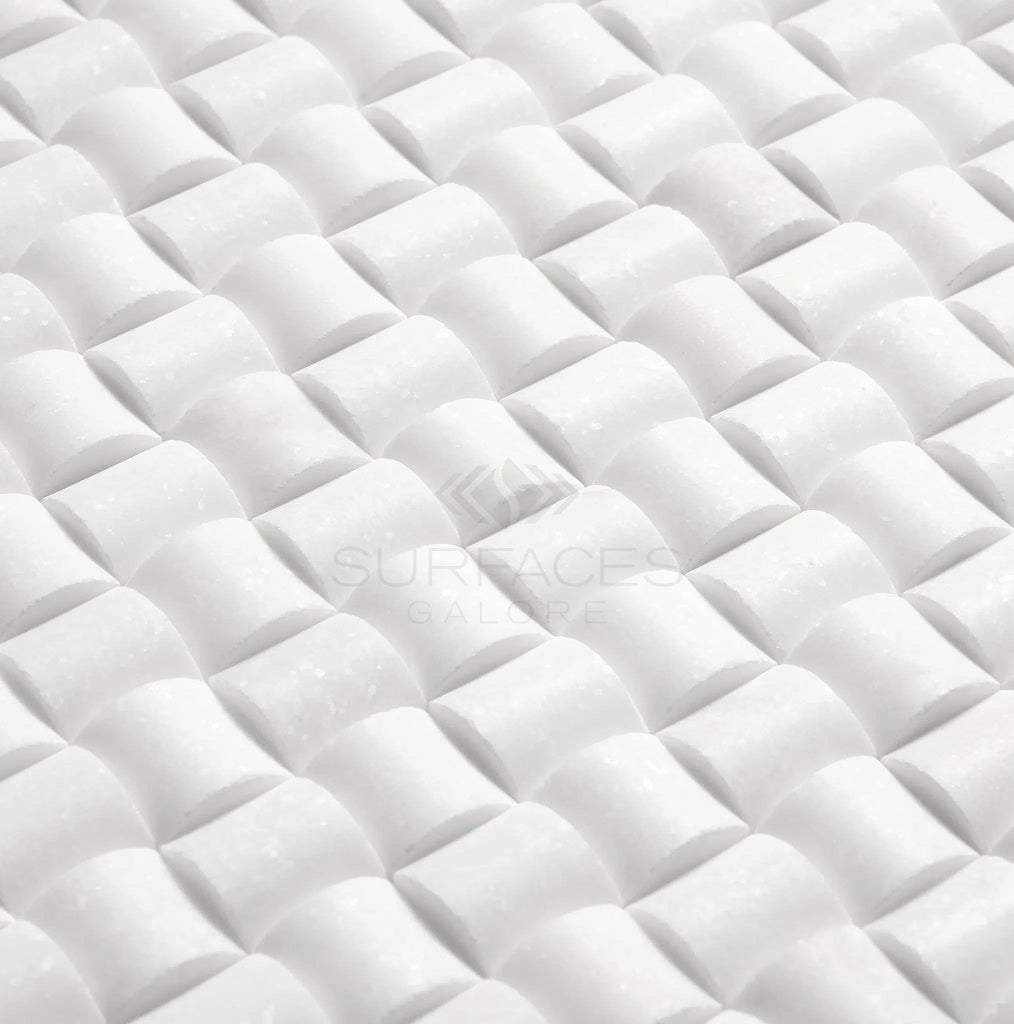 Thassos White (Greek) 3-D Small-Bread Mosaic Marble Polished-Honed features a luxurious and modern woven design, making it perfect for SurfacesGalore.