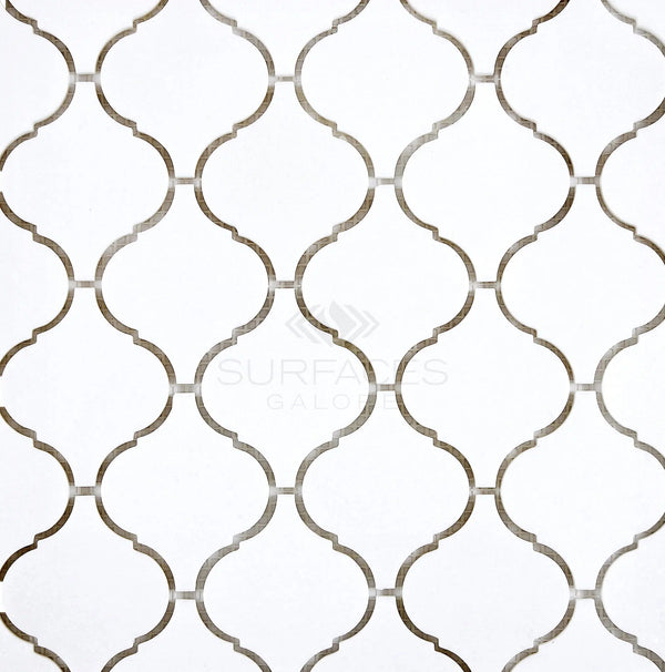 Thassos White (Greek) 3 inch Lantern Mosaic Marble Polished-Honed tiles featuring a white arabesque pattern accented with gray grout lines and the SurfacesGalore logo in the center.